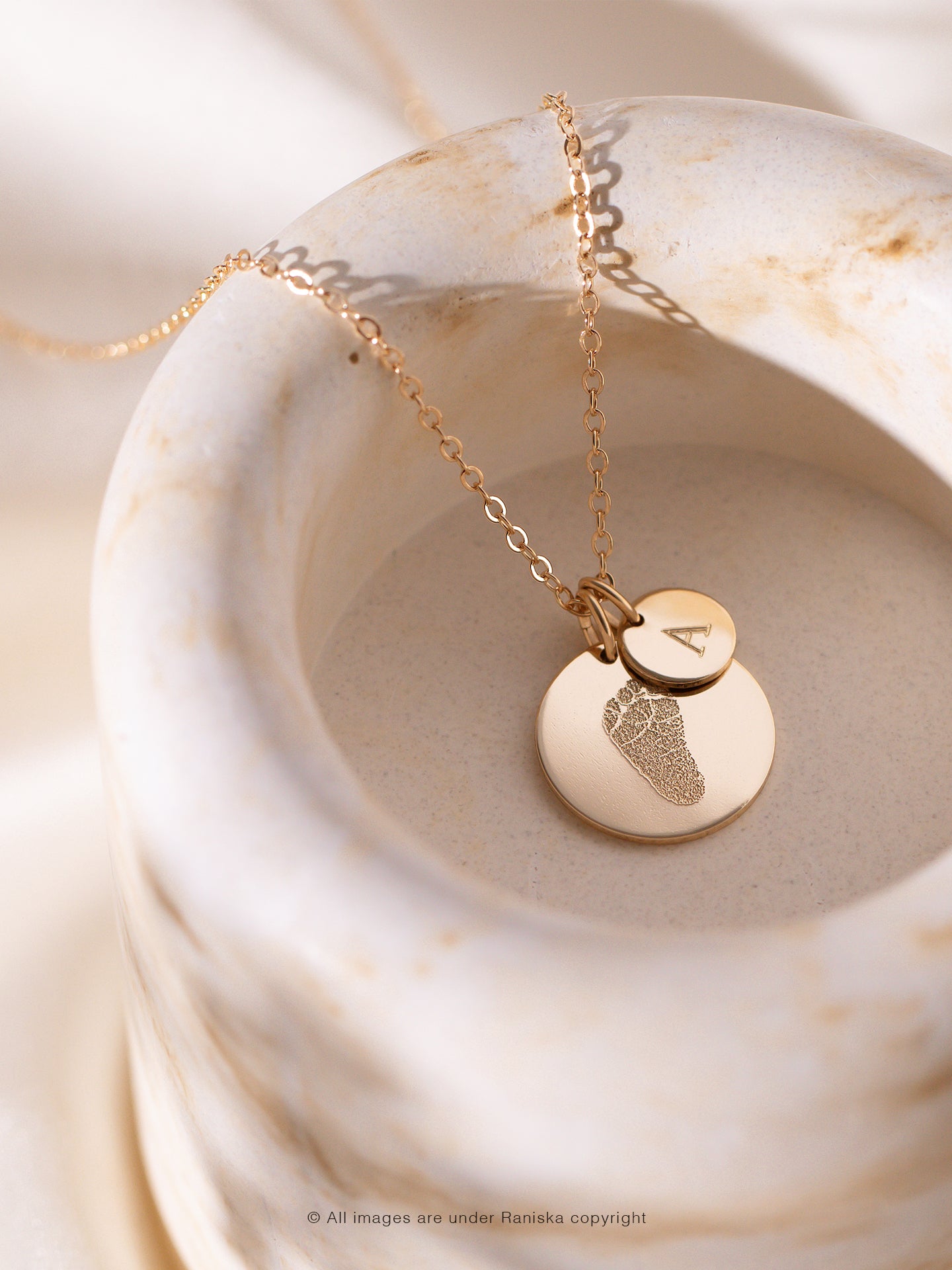 Akela Medium Footprint Necklace